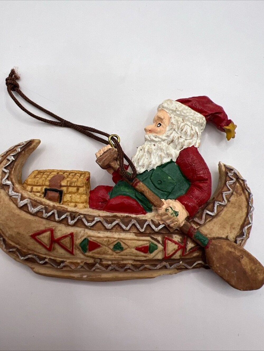 Vtg Santa Paddling His Canoe Folk Art Christmas Ornament 2x3.5”